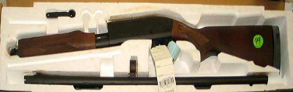 Appraisal: A boxed gauge Remington Model Express semi-automatic shotgun Serial no