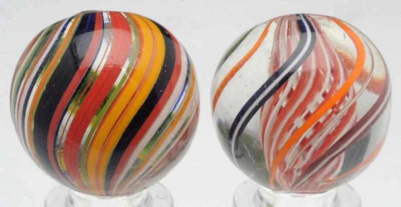 Appraisal: Lot of Handmade Swirl Marbles The smaller marble is a