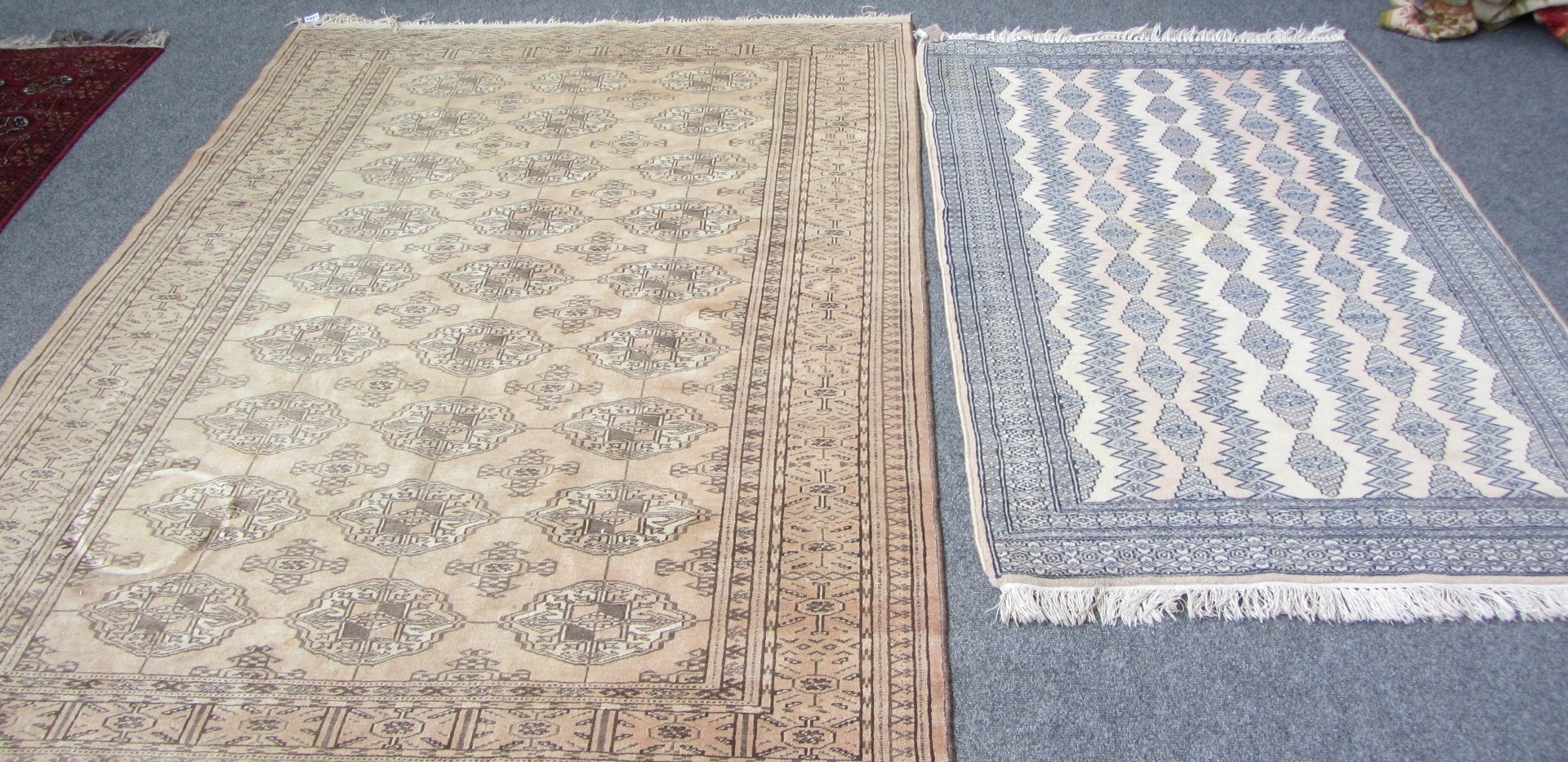 Appraisal: A Turkeman rug the washed madder field with three columns