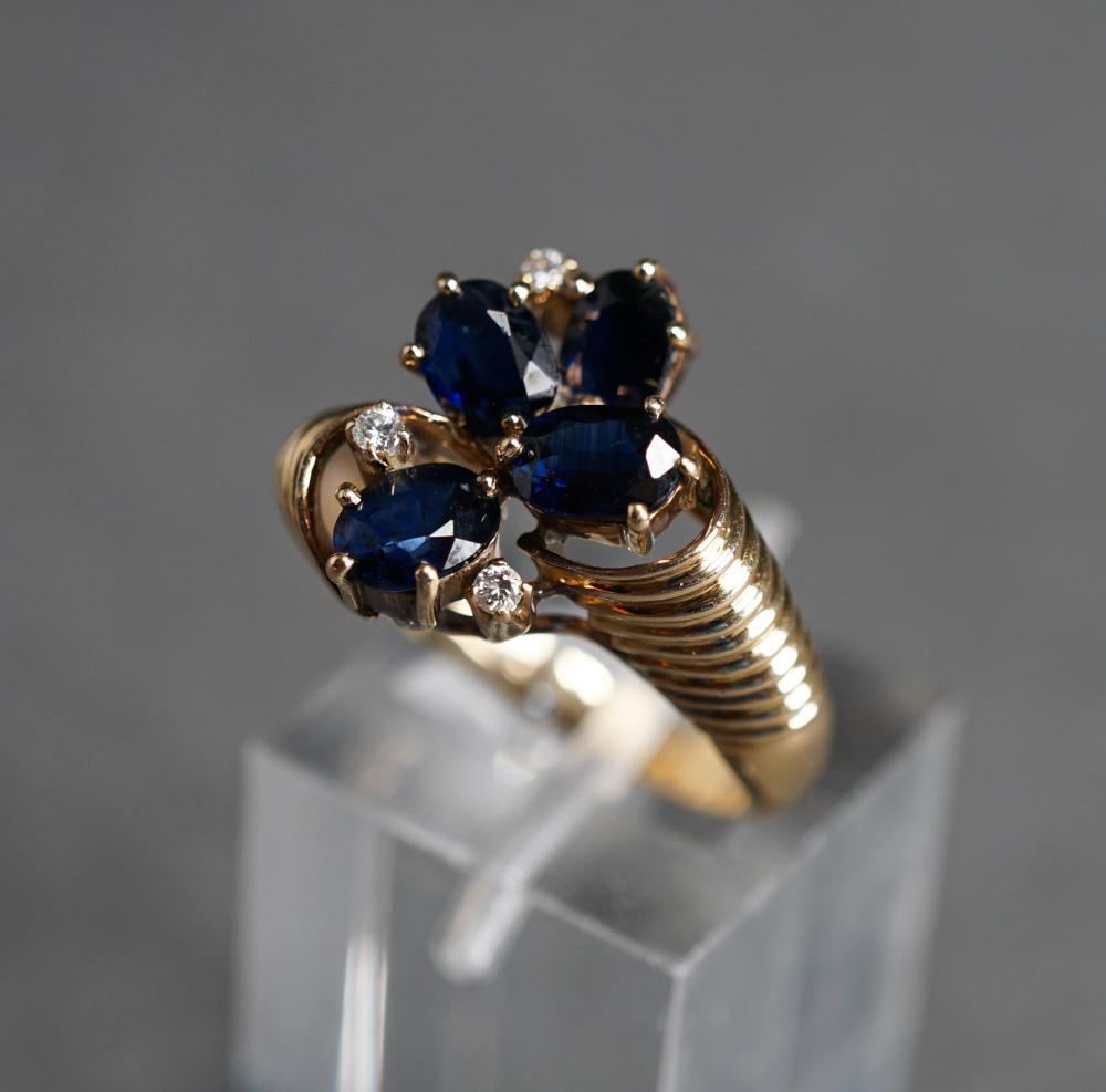 Appraisal: TESTED -KARAT YELLOW-GOLD BLUE SAPPHIRE AND DIAMOND RING GROSS DWT