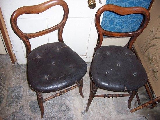 Appraisal: A pair of Victorian buckle back chairs the buttoned seats