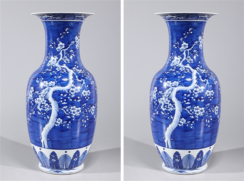 Appraisal: Pair of Chinese blue and white porcelain vases with blossoming