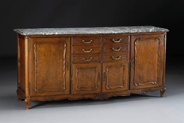 Appraisal: A Louis XV style oak buffet late th early th