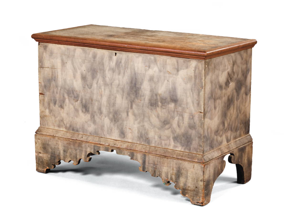 Appraisal: NEW ENGLAND SMOKE-DECORATED DIMINUTIVE PINE BLANKET CHEST The hinged top