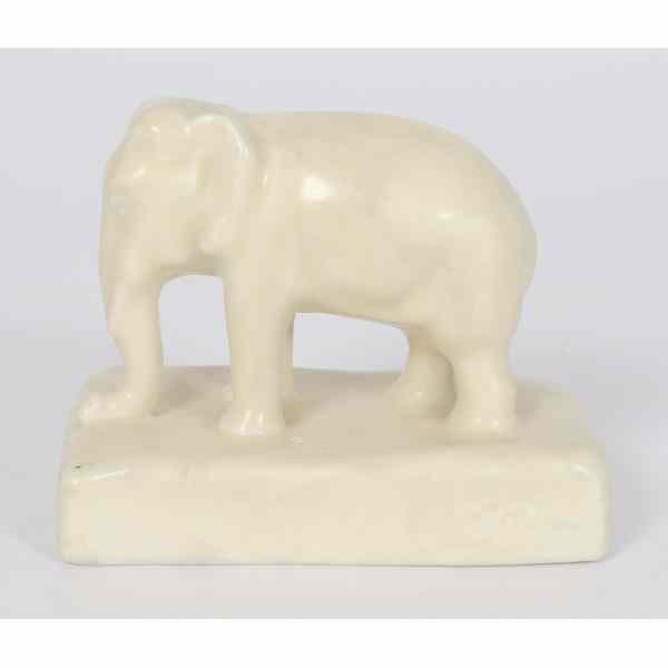 Appraisal: Rookwood Elephant Paperweight American a elephant paperweight covered in an