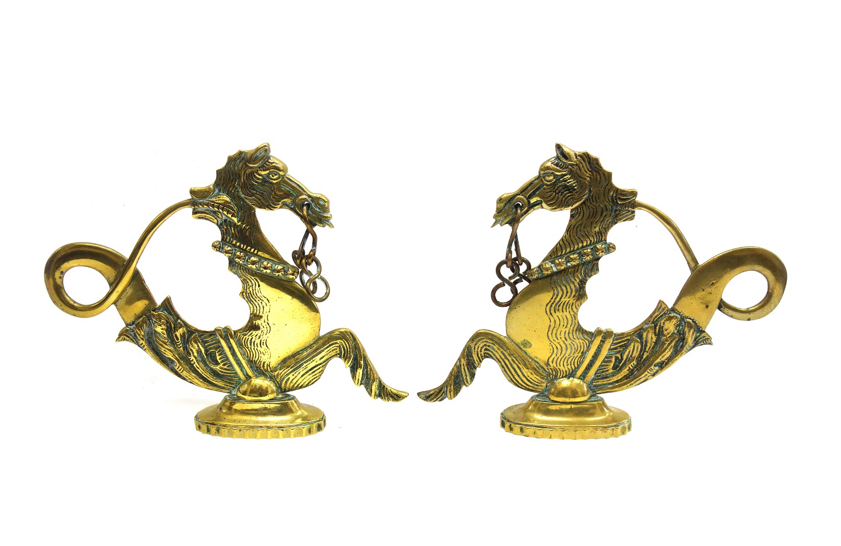 Appraisal: A pair of brass figures cast as horse's heads first