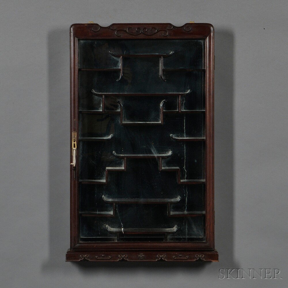 Appraisal: Glazed Wall Display Cabinet China rectangular mirror-backed carved with foliate