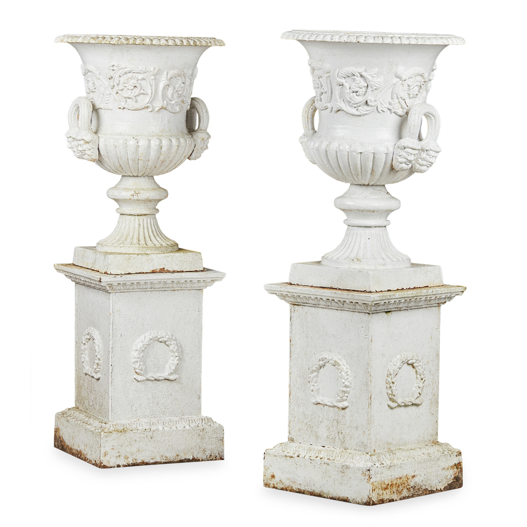 Appraisal: PAIR OF LARGE VICTORIAN WHITE PAINTED CAST IRON URNS AND