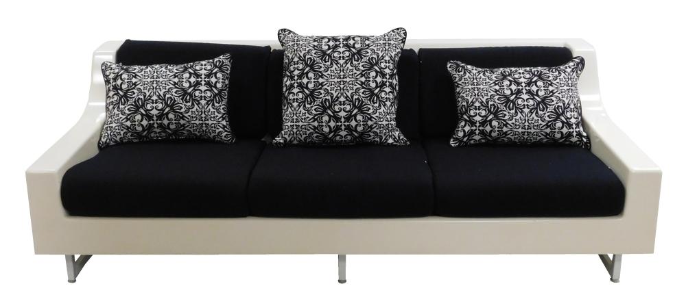 Appraisal: Mid-century sofa molded white fiberglass with removable black fabric cushions