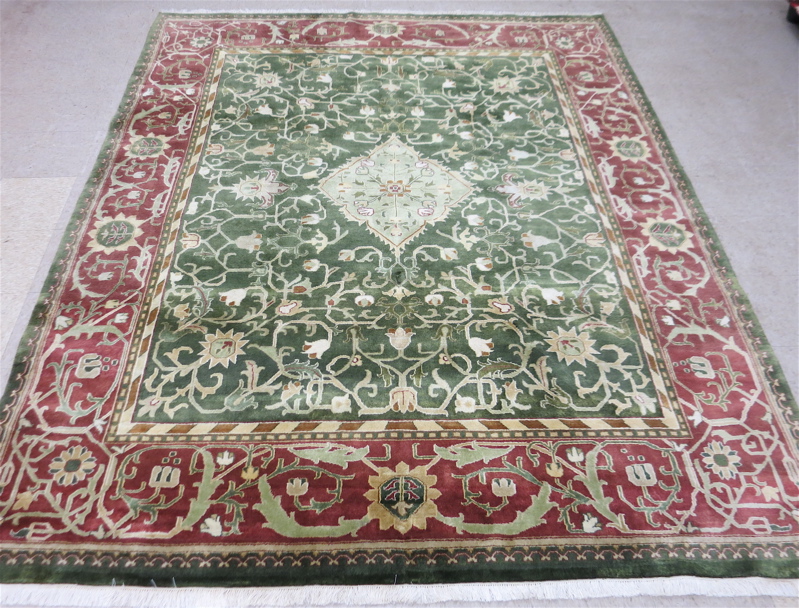 Appraisal: HAND KNOTTED ORIENTAL CARPET Indo-Persian central diamond medallion and scrolling