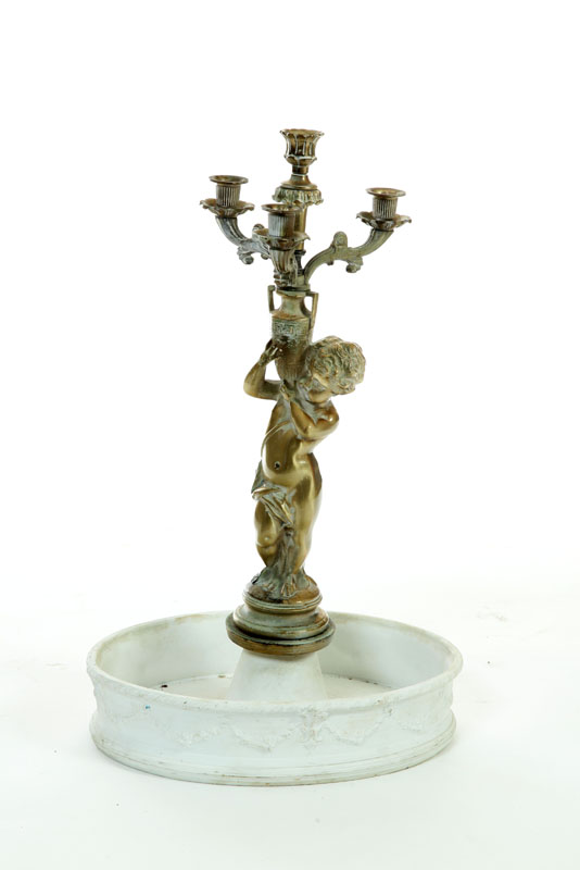 Appraisal: FIGURAL CANDELABRA Germany late th century Oval parian bowl marked