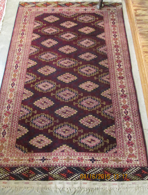 Appraisal: RUSSIAN-TURKMENISTAN AREA RUG hand knotted in a repeating geometric Turkoman