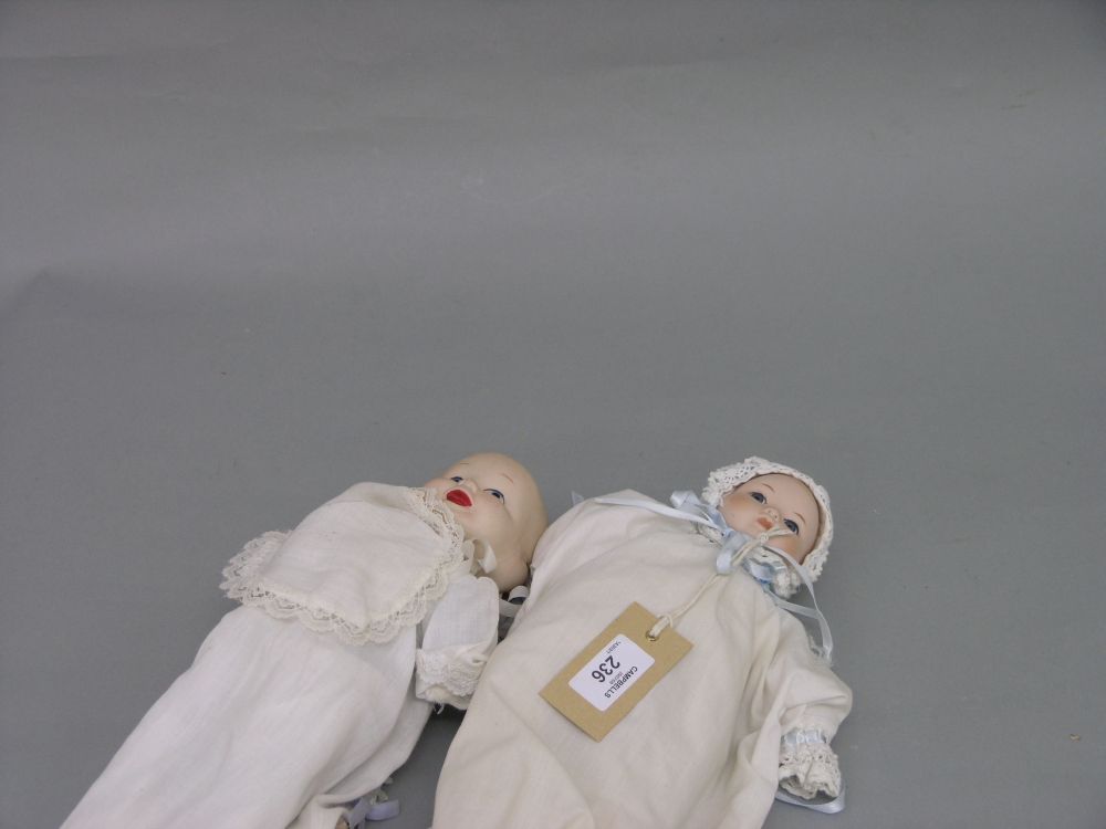 Appraisal: A modern bisque doll unusual with three faces varying expressions