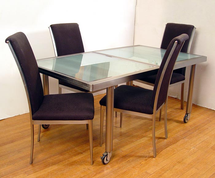 Appraisal: MODERN CHROME AND GLASS TOP DINING TABLE WITH CHAIRS The