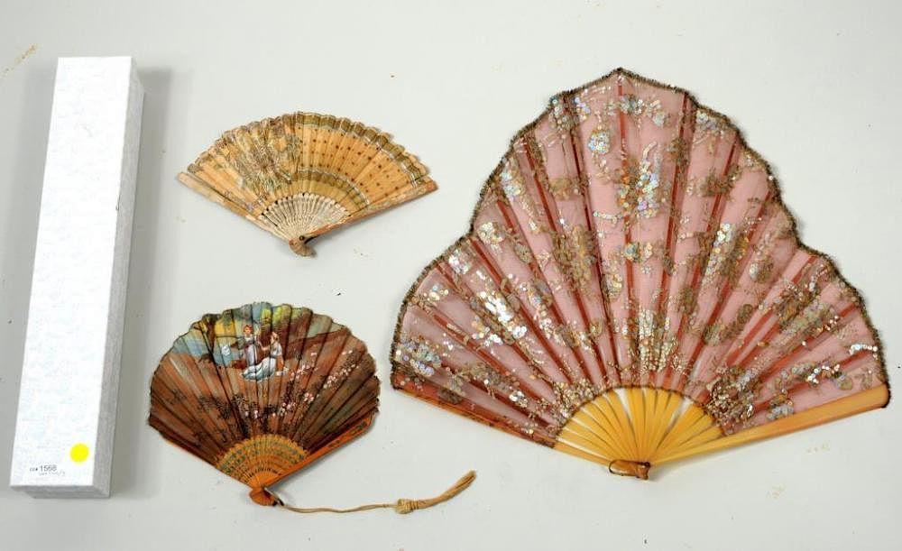 Appraisal: Three Antique Fans Three antique fans including a celluloid and