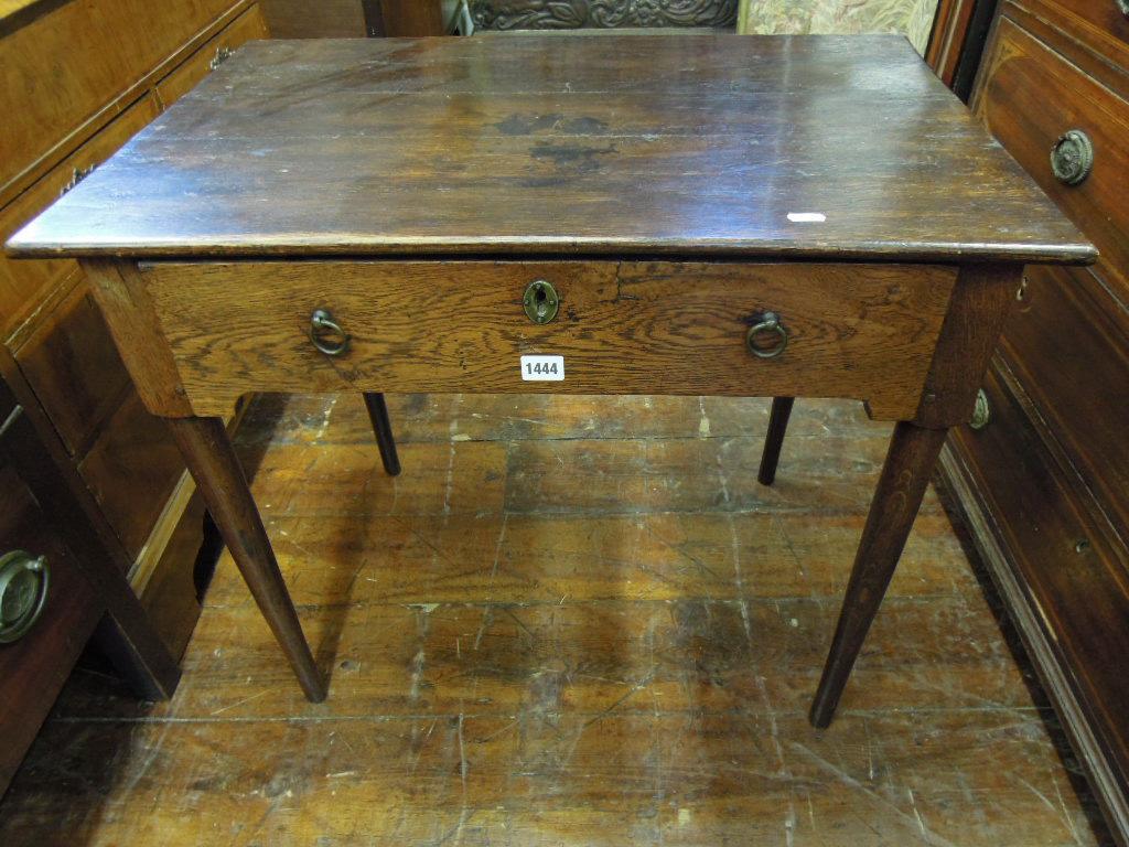 Appraisal: A Georgian oak side table fitted with a frieze drawer