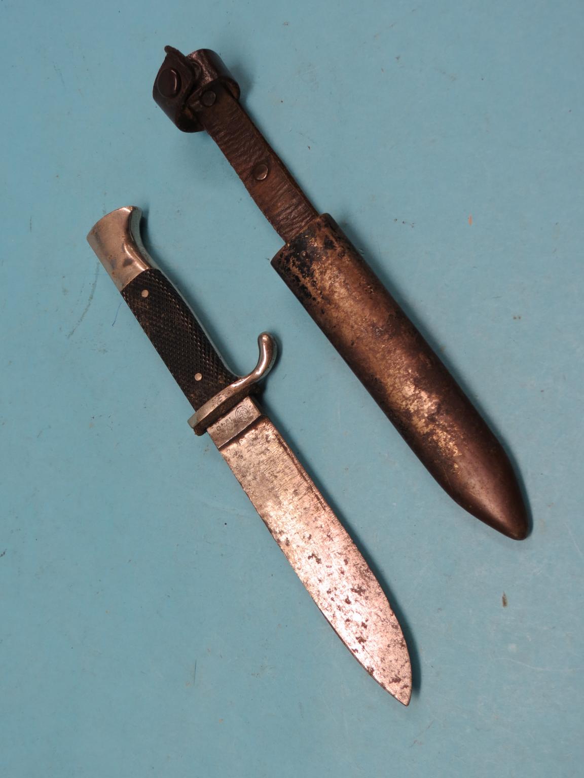 Appraisal: An Hitler Youth dagger in straight single-edged blade marked RZM