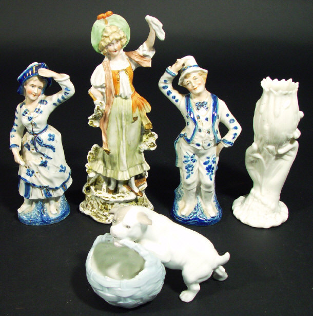 Appraisal: Pair of continental porcelain figures with blue painted clothes one