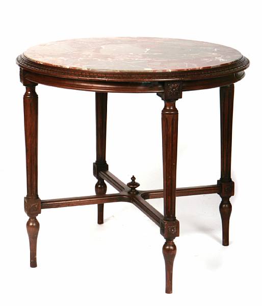 Appraisal: A Louis XVI style mixed wood marble top center table