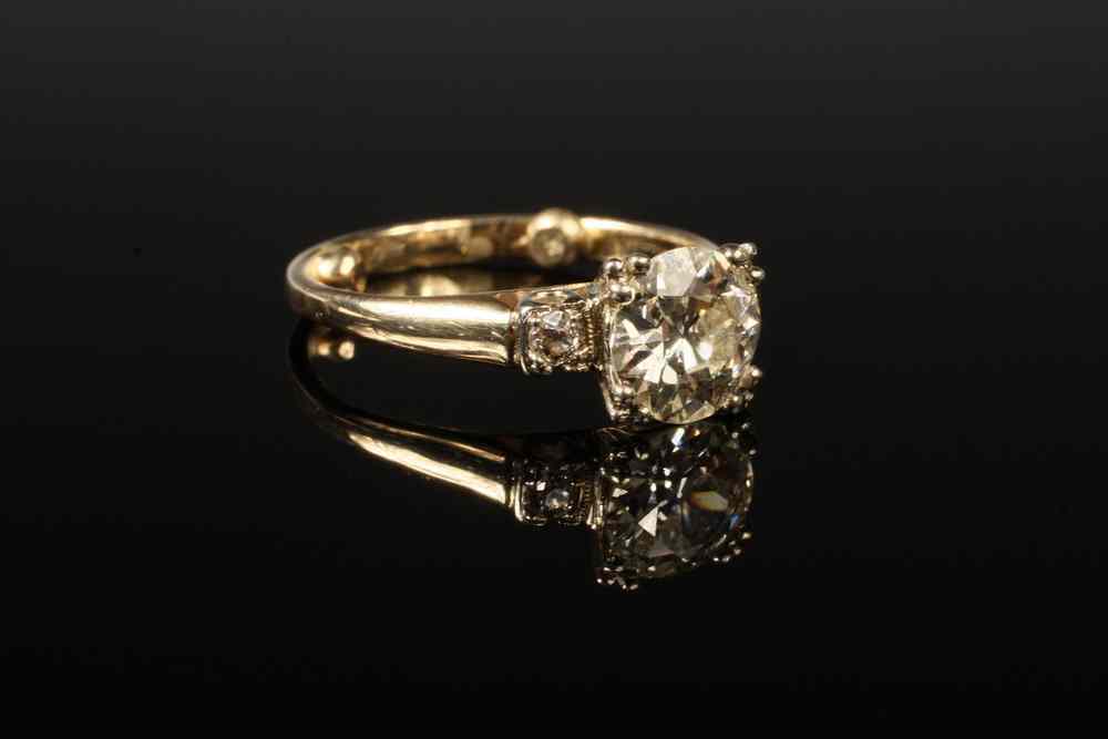 Appraisal: LADY'S RING - One K white and yellow gold engagement