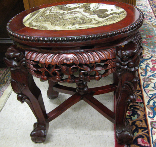 Appraisal: PAIR OF CARVED ROSEWOOD OCCASIONAL TABLES Chinese th century Each