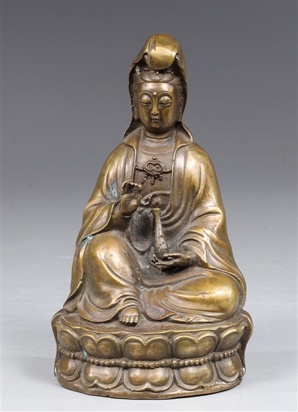 Appraisal: Chinese bronze seated figure of Guanyin seated in the position