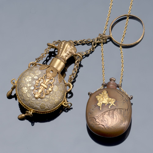 Appraisal: Two th C flasks as adornment Japanese shikuda pendant snuff