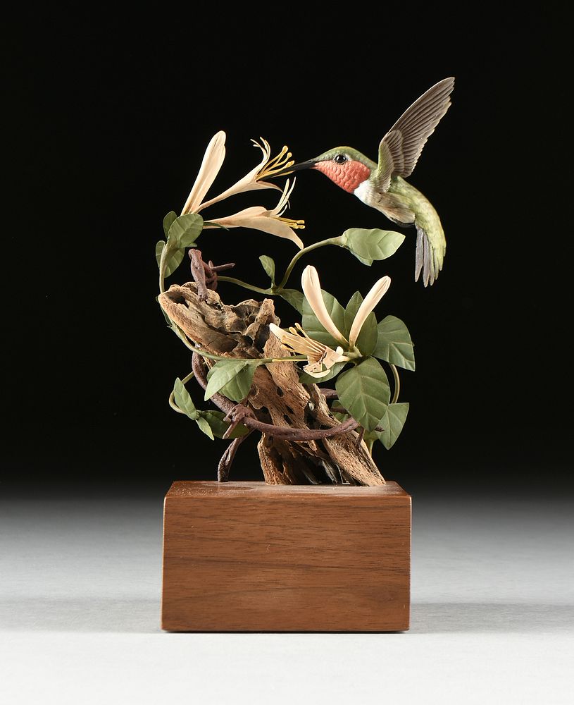 Appraisal: JAMES E HAZELEY American - A WOOD SCULPTURE Ruby Throated