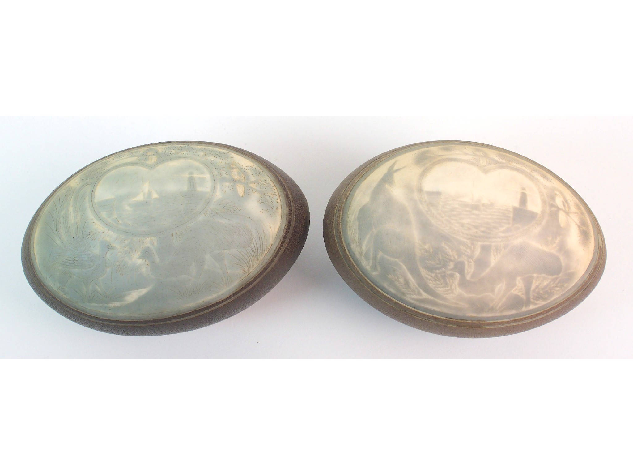 Appraisal: A near pair of Cameo carved Emu Eggsdecorated with kangaroo