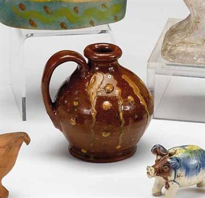 Appraisal: Miniature slip decorated redware jug probably pennsylvania th century Of