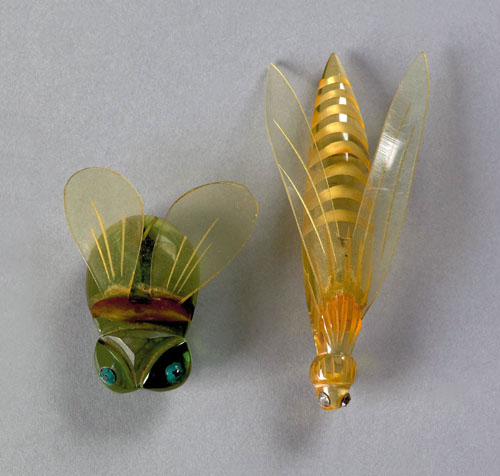 Appraisal: Two rare bakelite and lucite bug-form brooches one a long