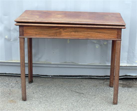 Appraisal: th century mahogany folding tea table on square legs h