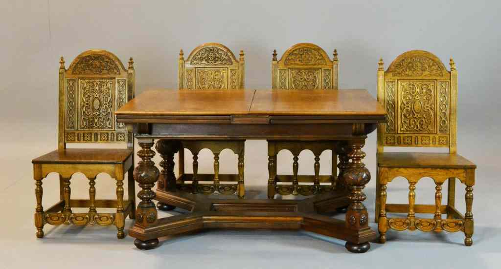 Appraisal: Piece Jacobean Table Chairs SignedHeavily carved oak dining set by