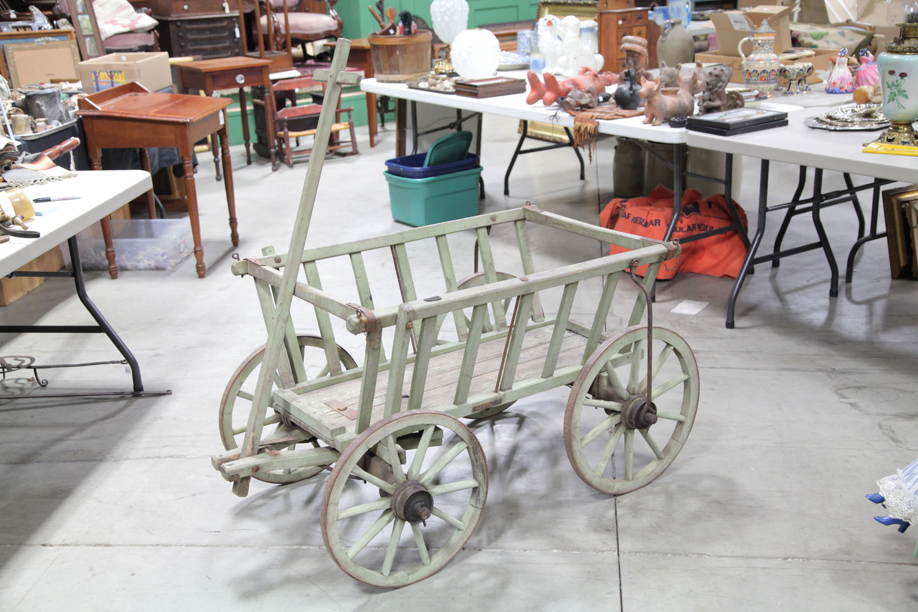 Appraisal: GOAT CART American late th century Green painted cart with