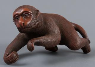 Appraisal: Ceramic Monkey Sculpture Signed With glass eyes and a stamp