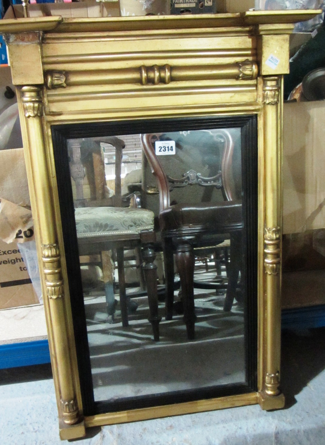 Appraisal: A th century giltwood overmantel wall mirror