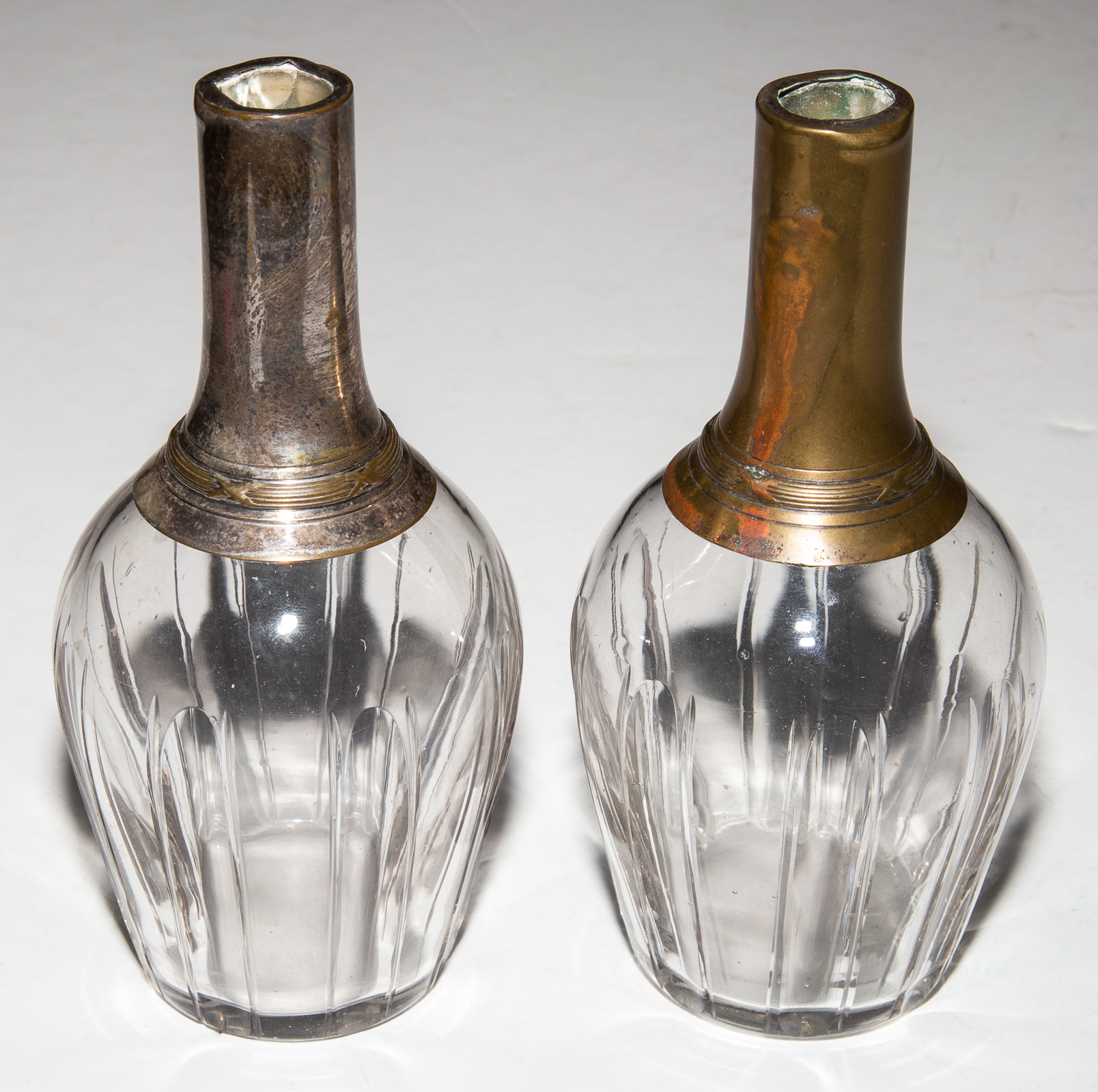 Appraisal: A PAIR OF SILVER PLATED CRYSTAL DECANTERS Continental late th-early