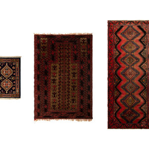 Appraisal: Three Turkish Wool Area Rugs th Century Larger feet inches