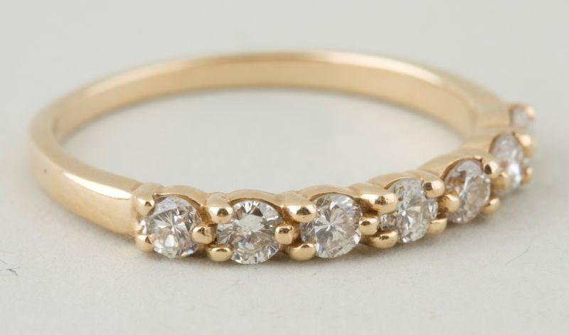 Appraisal: KT Yellow Gold Diamond Wedding Band with prong set round