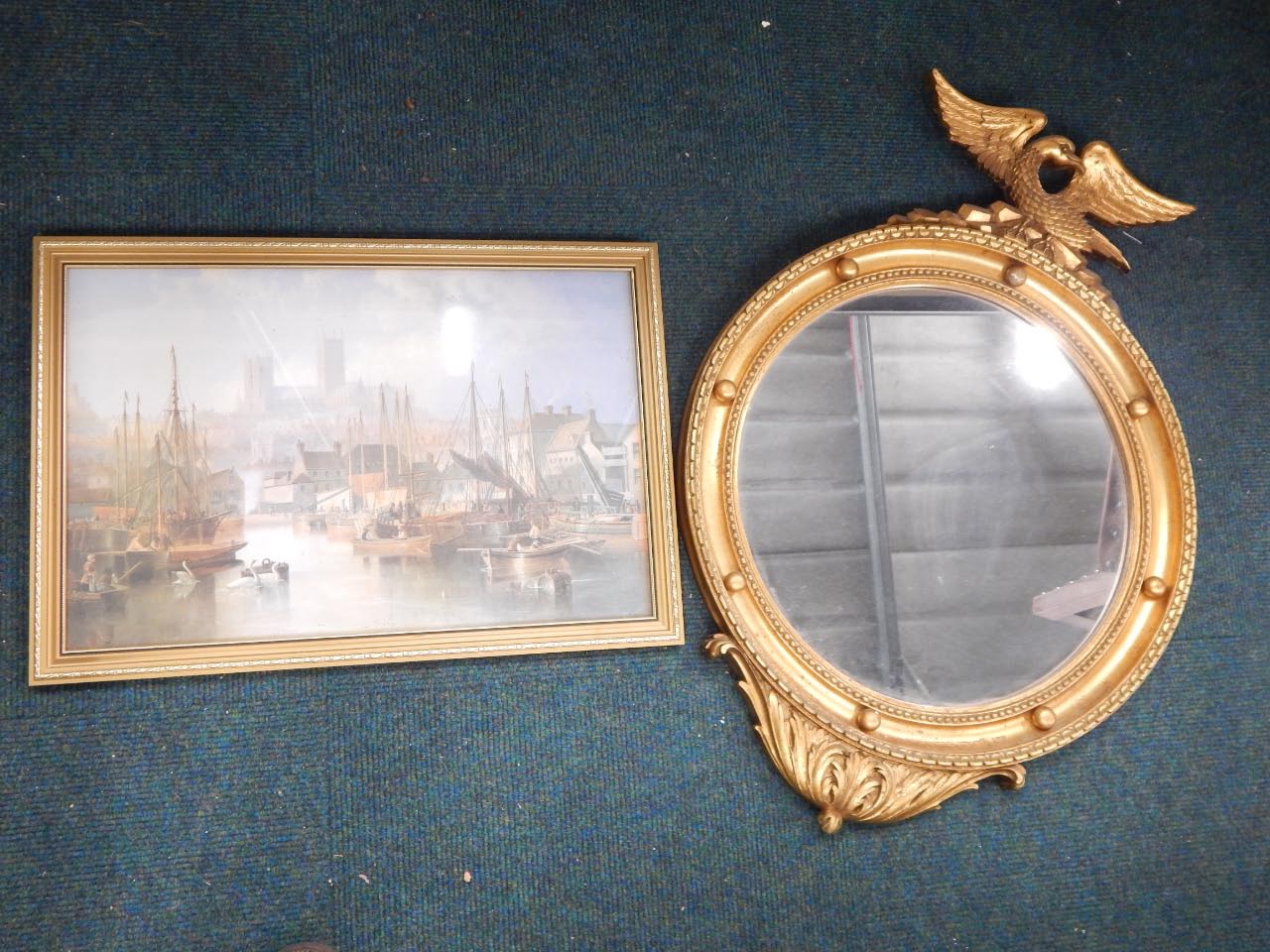 Appraisal: A thC convex circular wall mirror with an eagle crest