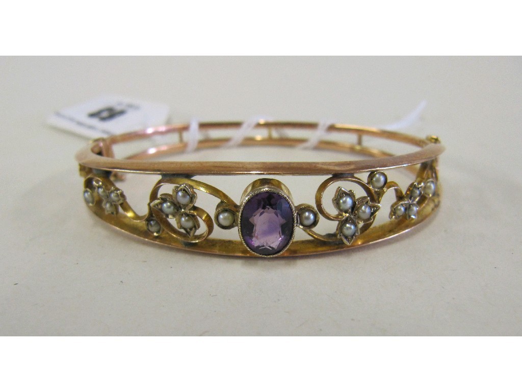 Appraisal: Edwardian ct rose gold seed pearl and amethyst set bangle