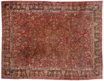 Appraisal: Sarouk rug repeating floral designs on salmon field s ft