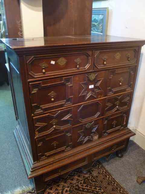 Appraisal: AN TH CENTURY OAK CHEST on low stand fitted with