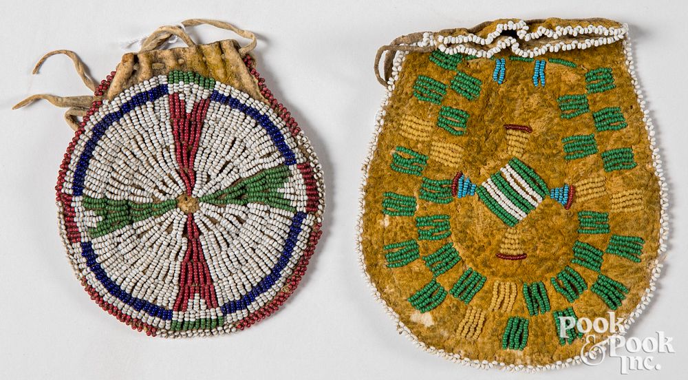 Appraisal: Two small Plains Indian beaded hide pouches Two small Plains