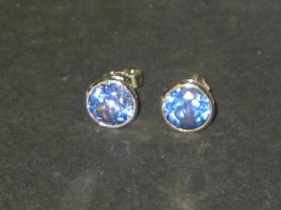 Appraisal: A PAIR OF SAPPHIRE EAR STUDS the round cut pale