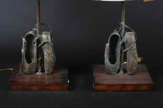 Appraisal: PAIR CONTEMPORARY PATINATED METAL TABLE LAMPS Modelled as pointe shoes