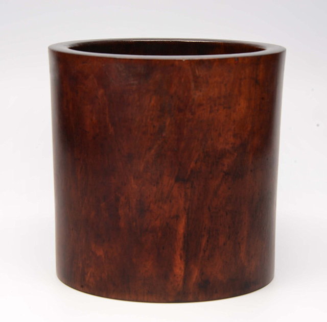 Appraisal: A CHINESE HUANGHUALI WOOD CYLINDRICAL BRUSH POT of plain form