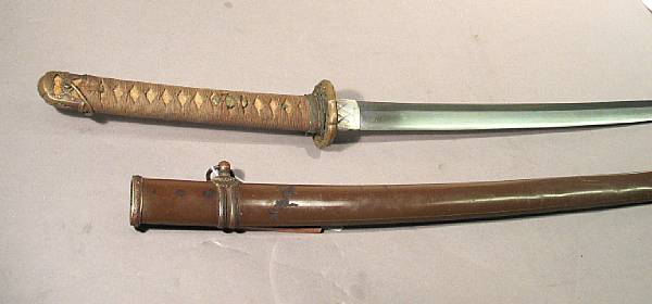 Appraisal: A Japanese officer's Showa Shin-gunto Slightly curved inch blade Silvered