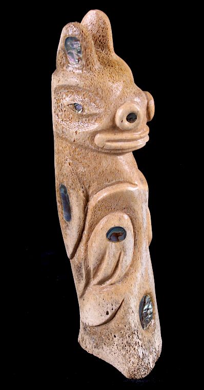 Appraisal: Tlingit Bear Carved Whale Bone Abalone Totem Included in this