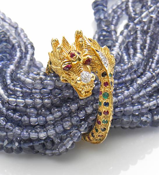 Appraisal: An iolite gem-set diamond and k gold torsade necklace length